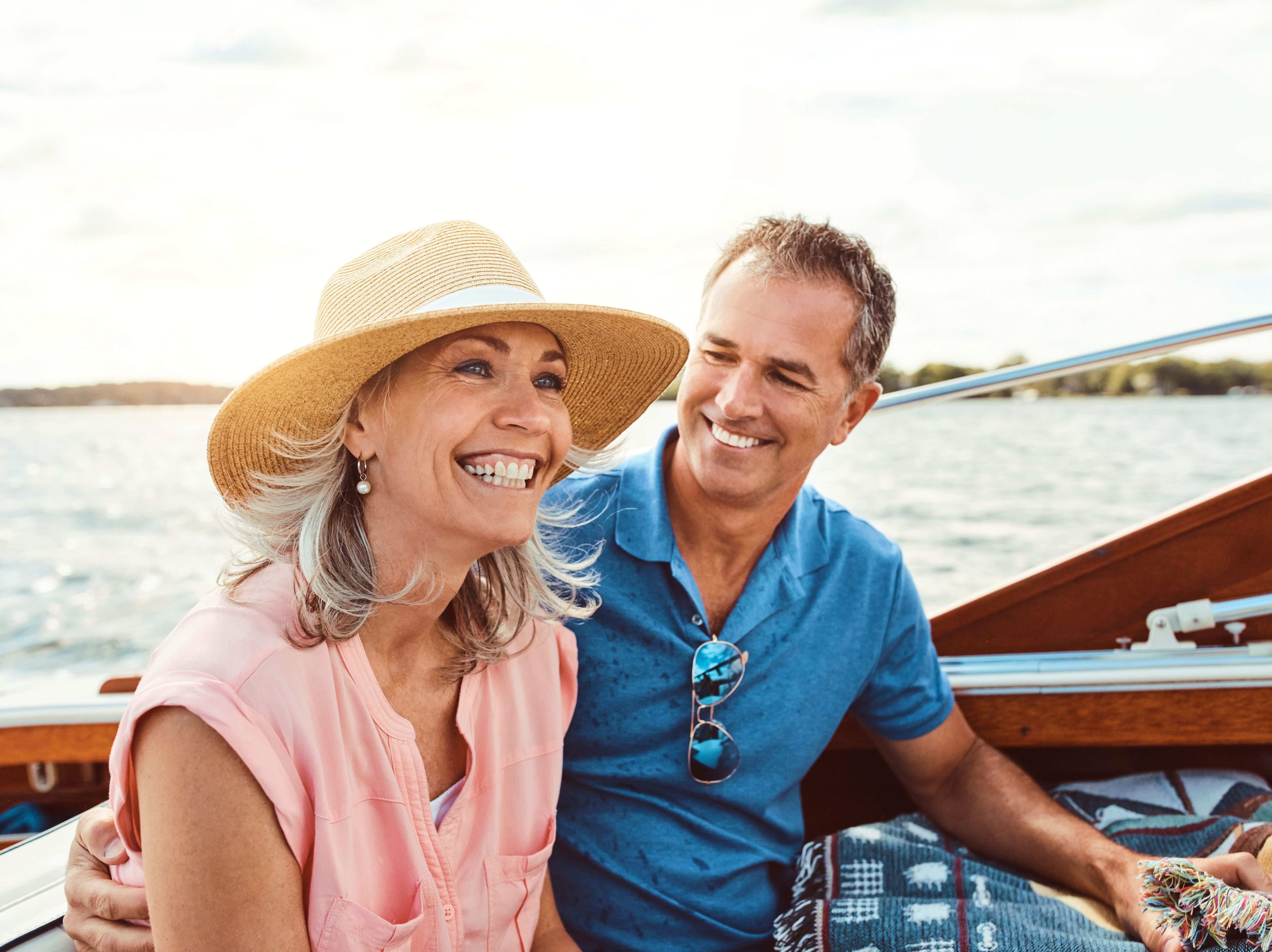 Smiling mature couple enjoying a peaceful moment after securing their future with a complete estate planning checklist and family document organizer from OWL Planner and Estately.
